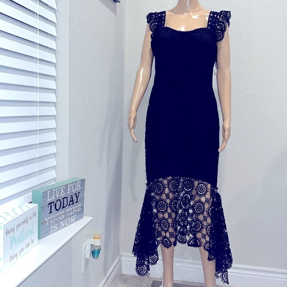 Vintage Lina black crocheted fully lined dress.